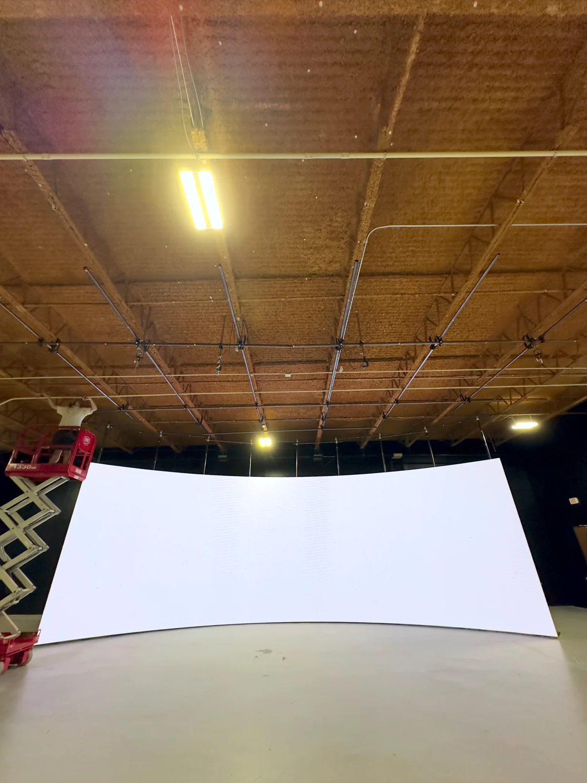 The unbroken white curve of the volume, lit flat before calibration